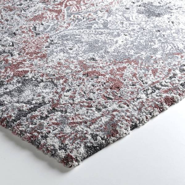 Detailaufnahme abstrakter designteppich in grau und rose von heineking24